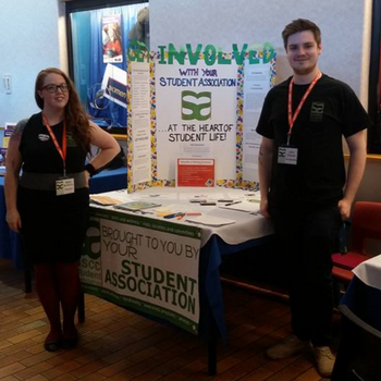 Isabella and Jake Graves at a campus event promoting the Student Association.