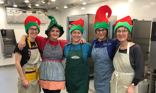 From left to right: Phil, Olivia, Nicole, Michelle, and Bern Byers at NSCC's Kingstec Campus making cheesecakes for cheesecake raffle winners. Missing: Laura Byers