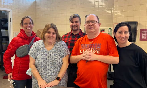 Five people look at the camera with excited faces ahead of attending the Abilympics in France.