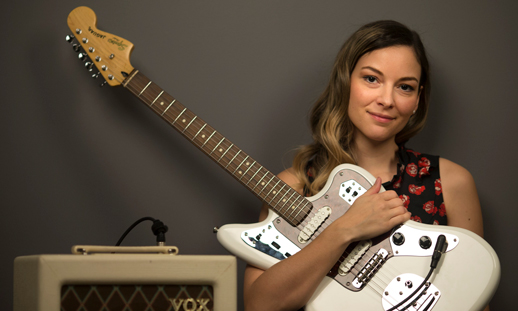 Chrissi Cochrane with guitar