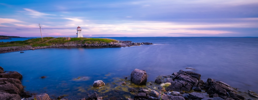 Photo of lighthouse during sunset