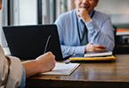 Photo of two colleagues in a meeting