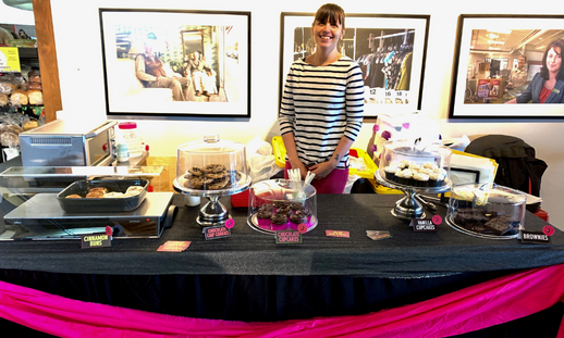 Sydney Daoust at her booth in Alderney Landing Farmer's Market selling baked goods.