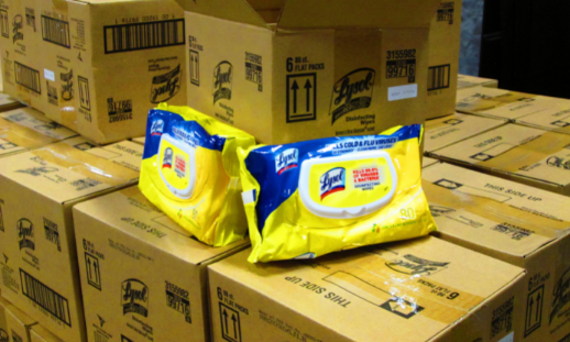 Photo of donated lysol wipes on boxes of donated lysol wipes