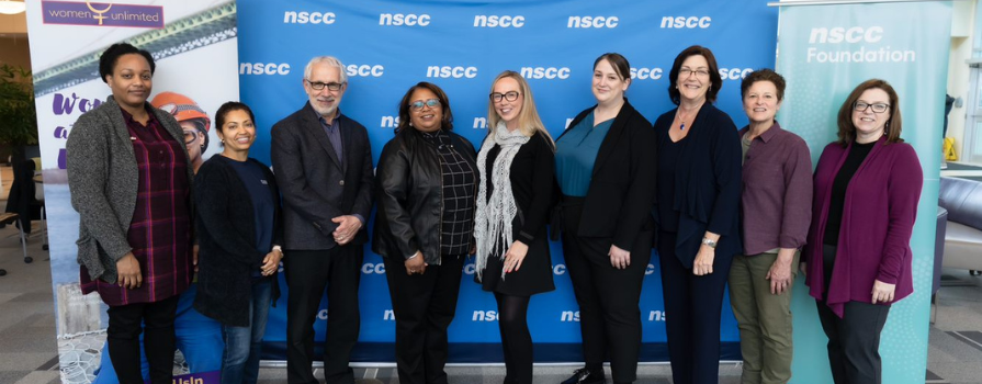 Photo of Admiral, Women Unlimited staff and alum, and NSCC staff and faculty at Admiral's announcement.