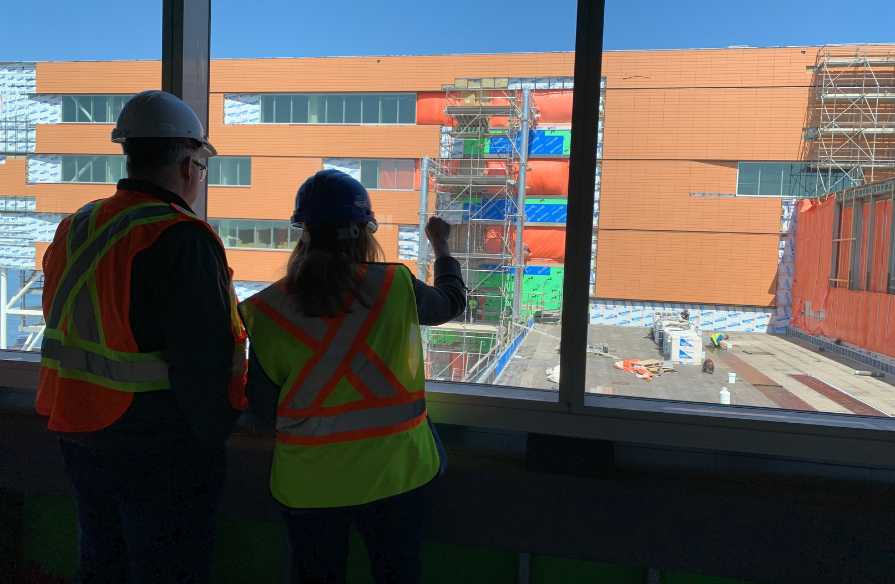 Photo from community engagement tour in Sydney Waterfront Campus pedway viewing the Campus.