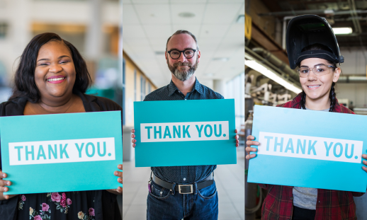 Photo of three NSCC award recipients holding a light blue sign saying "thank you" in white text.