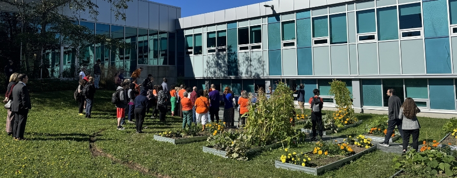 NSCC employees, students and supporters gathered outside NSCC's IT Campus for the opening ceremony of Iga'taqan, the new reconciliation garden at the Campus.