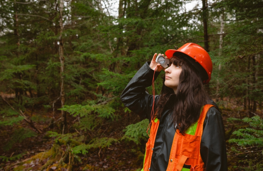 NSCC student in the forest.
