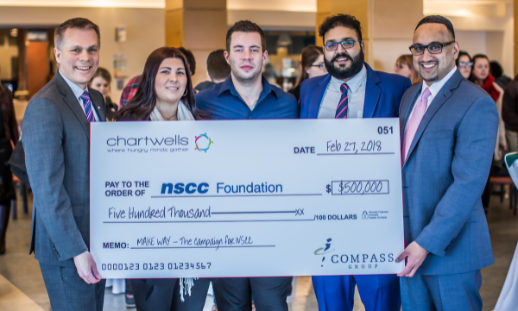 In the photo (L-R): Don Bureaux, President, NSCC; NSCC Student Association Presidents Akash Pandey (Ivany Campus), Krista Holland-Guy (IT Campus) and Mike Pinkney (Truro Campus); and Ashton Sequeira, President at Compass Group, Chartwells’ parent company holding $100,000 cheque