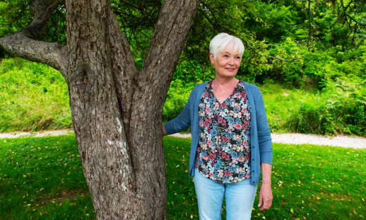  Cherie MacLeod standing outside next to a tree in the South Shore.