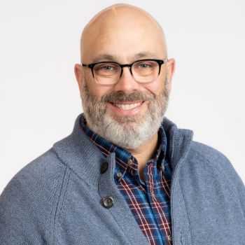 A headshot of Howie Doiron.