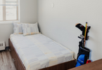 Photo of bed with white covers