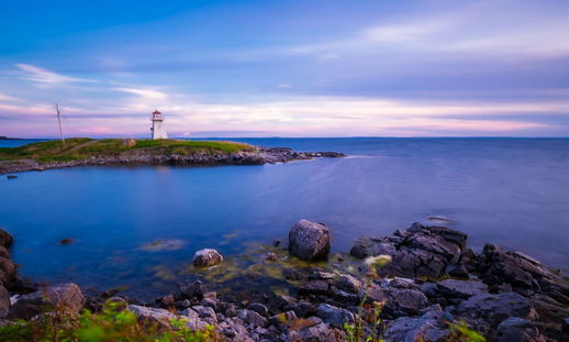 Photo of lighthouse during sunset