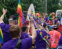 Photo of NSCC community waving pride flags at a pride parade