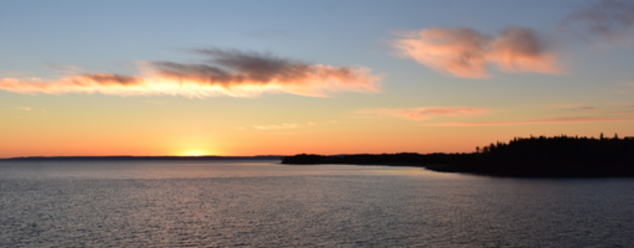 Photo of lake during a sunset