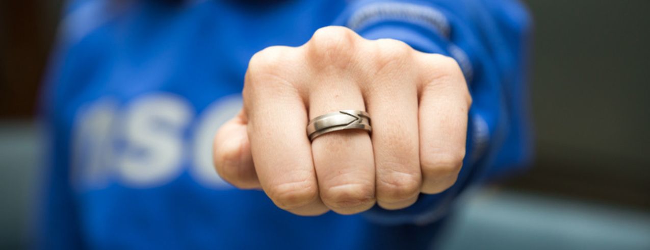 Close up of the NSCC Alumni Ring on a woman’s hand. She’s standing with her arm outstretched to the camera.