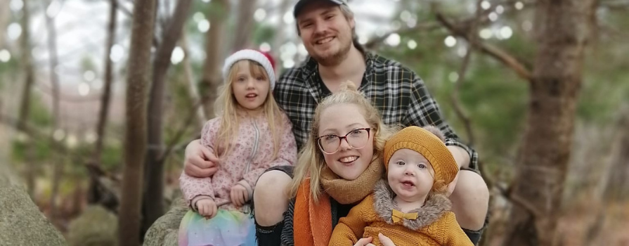 Isabella and Jake Graves on a walk in the forest with their daughters, Adelaide and Celeste.