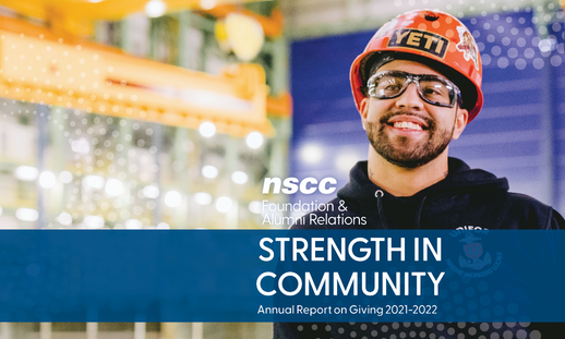 Photo of man in a large garage wearing a hardhat and safety glasses. The NSCC Foundation & Alumni Relations logo in white above a blue banner that reads, "Strength in Community" and "NSCC Foundation and Alumni Relations Annual Report on Giving 2021-2022"