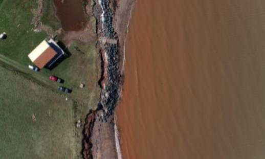 An aerial shot of coastline along the Northumberland Shore.