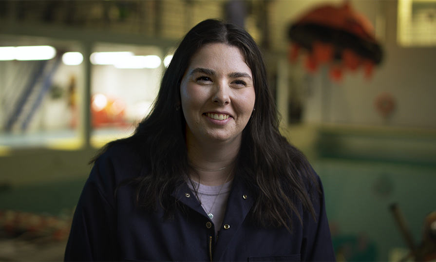 Hannah, Bridge Watch Rating student, smiling into camera