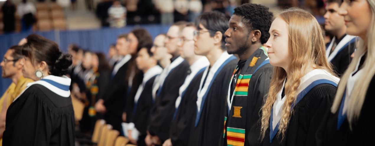 A group of NSCC graduates stand together during a Convocation ceremony.