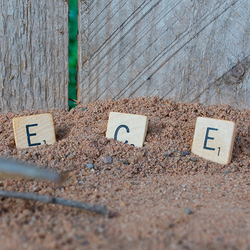 Letters ECE made with scrabble tiles