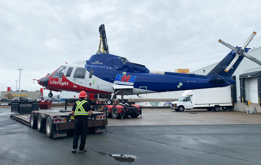 C-GIMN, the Sikorsky S-76 helicopter is readied for transport to NSCC's Aviation Campus