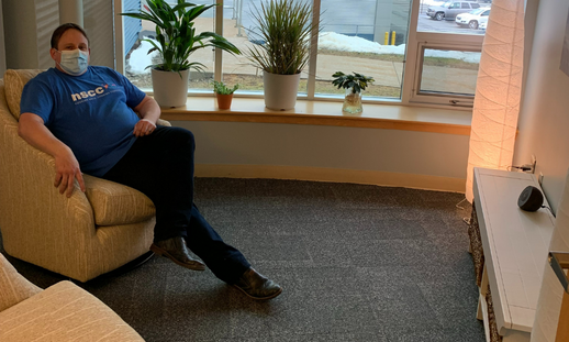 Photo of Lunenburg Campus Student Services Manager, Jeremy Porter, in new campus quiet space