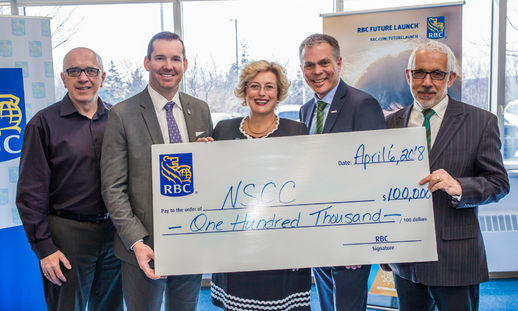 Photo of NSCC President Don Bureaux and RBC representatives holding $100,000 donation cheque