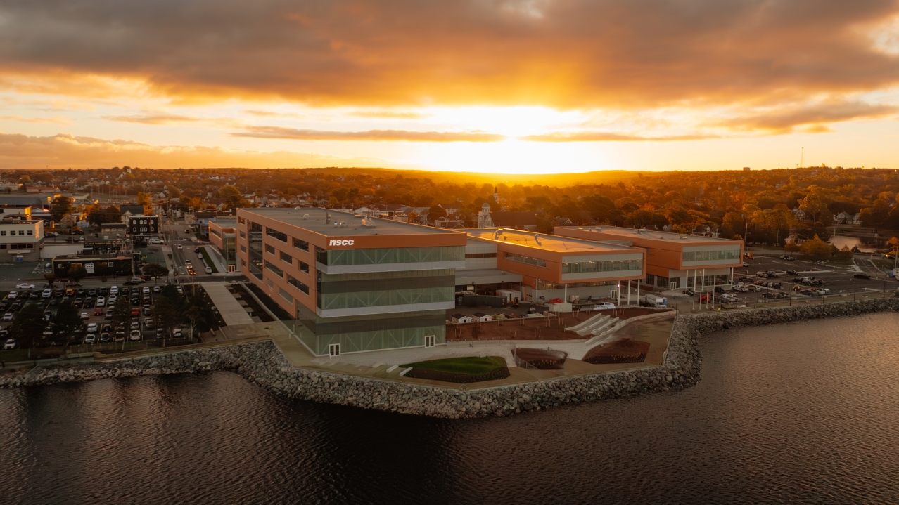 Aerial drone photo of Sydney Waterfront Campus during sunrise.