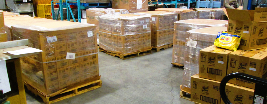 Photo of the pallets of donated lysol wipes to NSCC