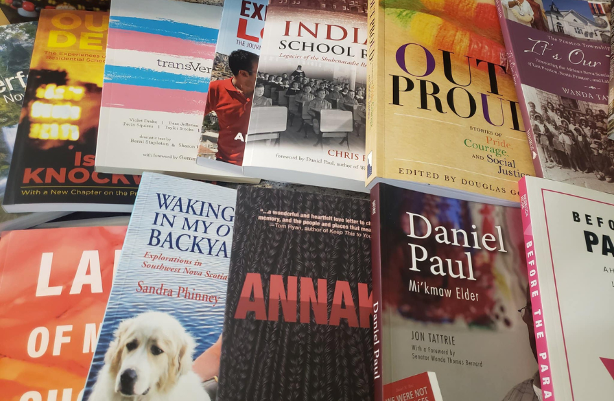 Photo of the book bundle Adsum House won in the Foundation's giveaway.