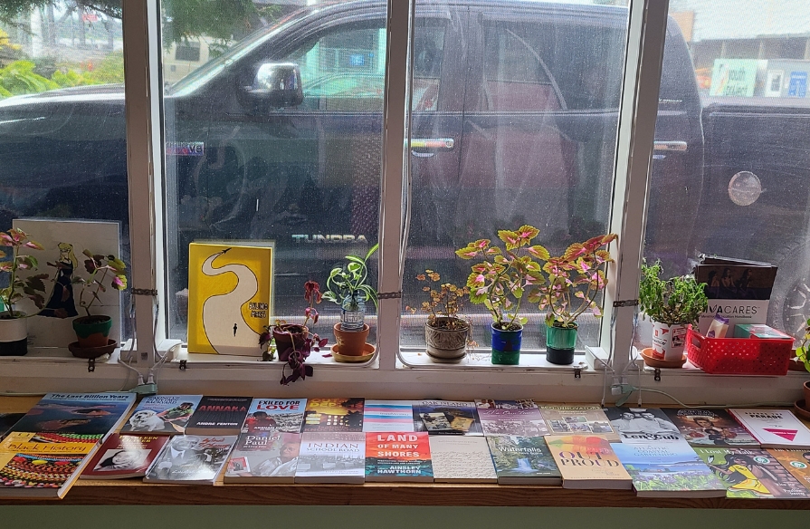 Cape Breton Youth Project's book bundle from the Foundation's giveaway on display in their window.
