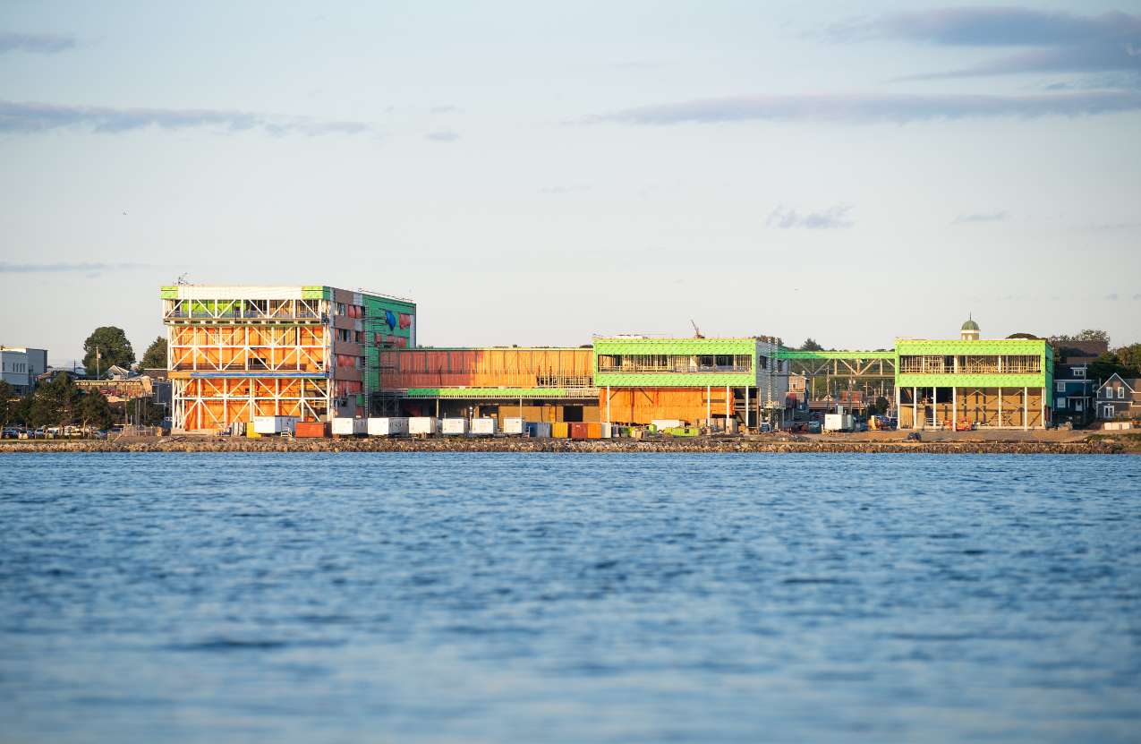 Photo from November 2022 of waterfront view of NSCC's Sydney Waterfront Campus under construction