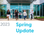 Hyperlinked NSCC Foundation Spring 2023 Update photo with students running in front of NSCC's IT Campus with text below saying "2022" in a grey coloured font to the left, followed by "Spring Update" in aqua coloured font to the right