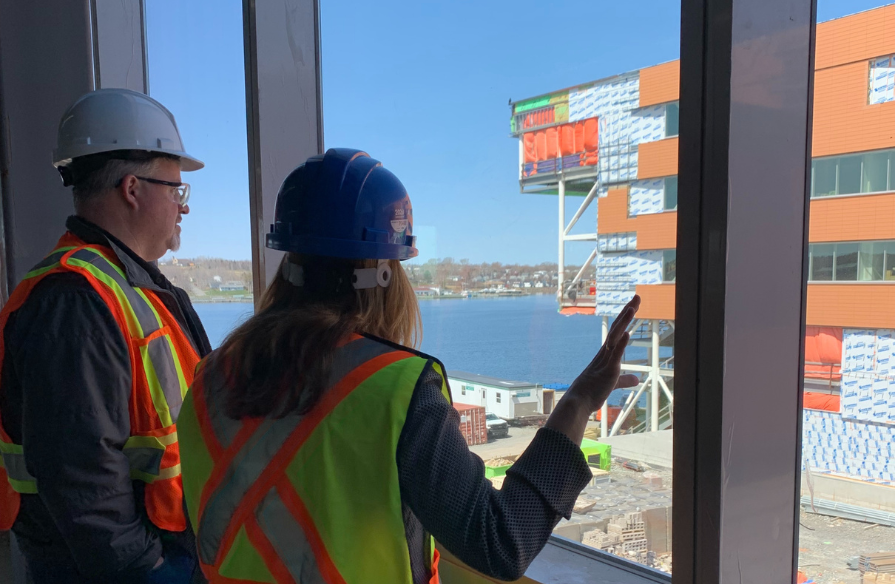 Photo from community engagement tour in Sydney Waterfront Campus pedway viewing the waterfront