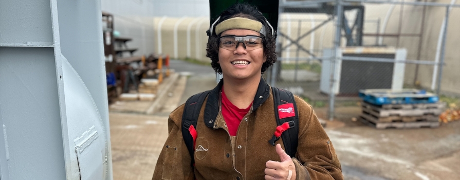 Charles Miranda in work gear at NSCC IT Campus's workshop.