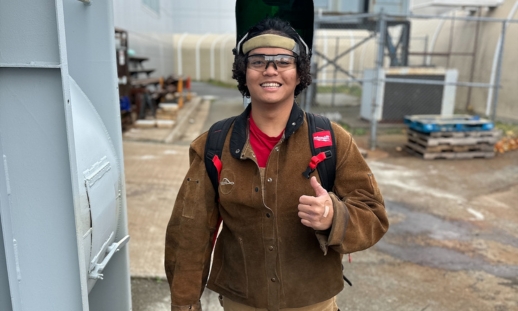 Charles Miranda in work gear at NSCC IT Campus's workshop.