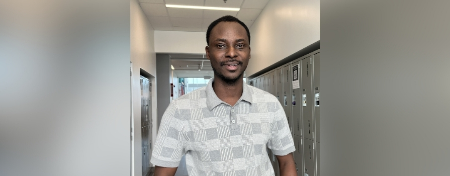 Photo of Blessing in hallway with faded background.