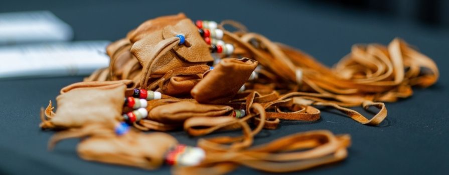 Image of medicine pouches laying on a table.