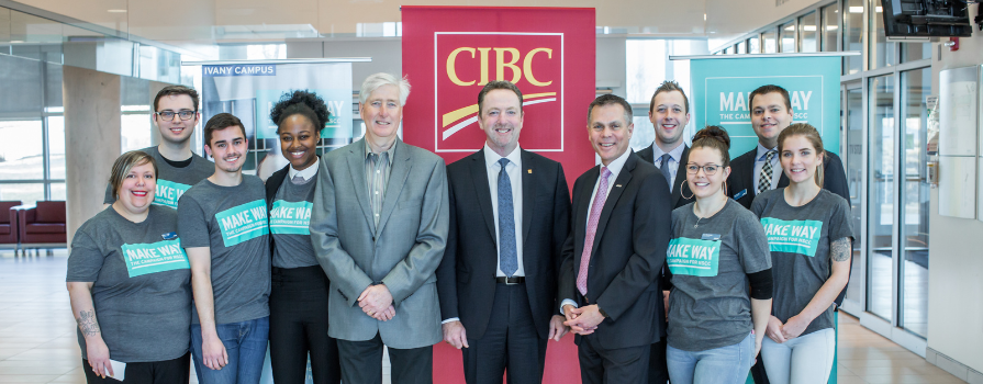 Photo of NSCC President Don Bureaux with CIBC executives and students in Make Way t-shirts