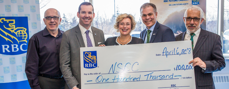 Photo of NSCC President Don Bureaux and RBC executives holding $100,000 cheque