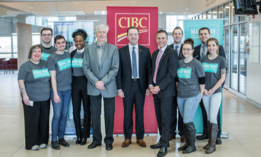 Photo of NSCC President Don Bureaux with CIBC executives and students in Make Way t-shirts