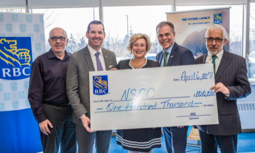 Photo of NSCC President Don Bureaux and RBC executives holding $100,000 cheque