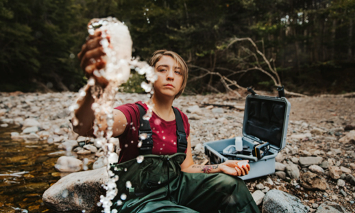 Student checking water samples