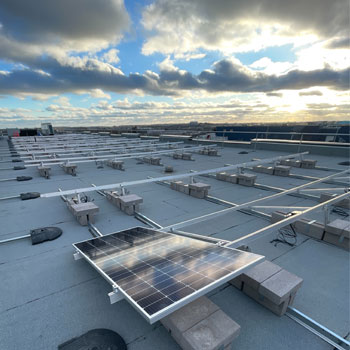 Image shows solar panels on a roof.