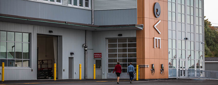 The partial exterior of the Centre for Ocean Ventures and Entrepreneurship is shown. The letters C O V E are attached to the side of the building.