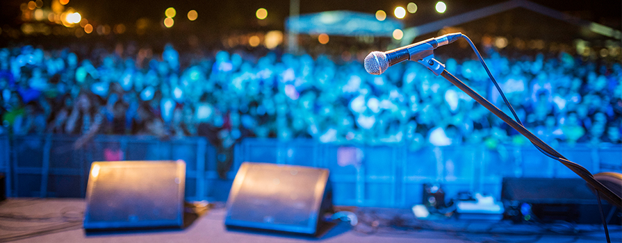 Music equipment in front of a live audience.