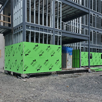 The outside view of the framing on a new construction site.